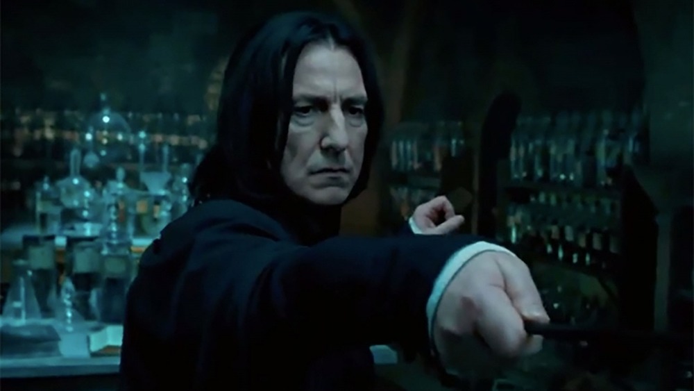 Snape brandishing his wand