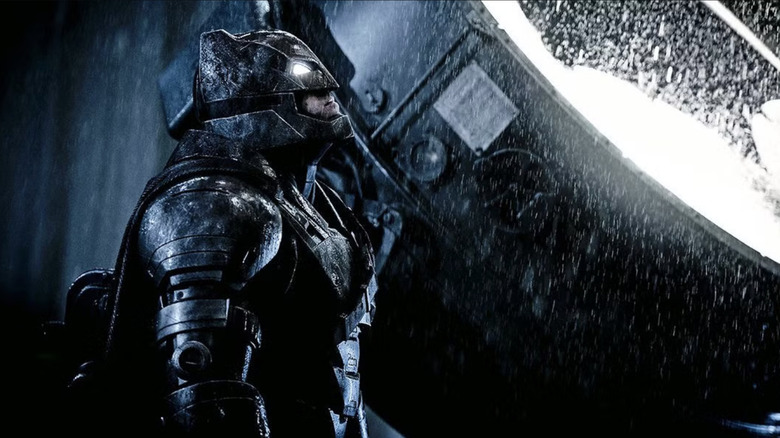 An armored Batman looks upward