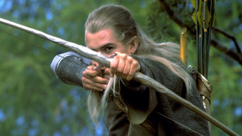 Legolas fires his bow