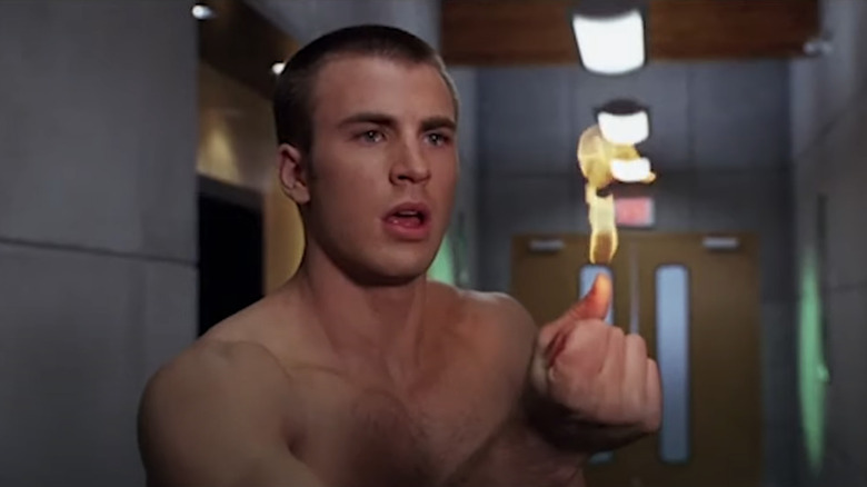 Chris Evans as the Human Torch catching fire