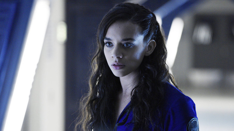 Hannah John-Kamen in corridor