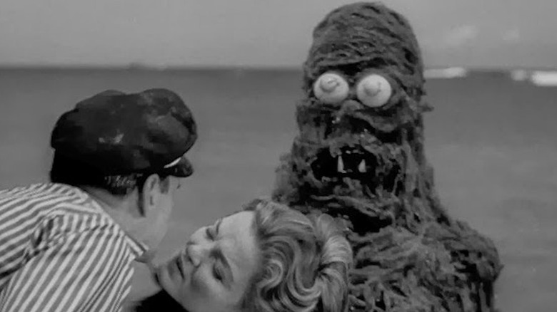 The Creature from the Haunted Sea sneaks up on Anthony Carbone and Betsey Jones-Moreland