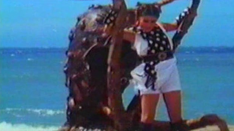 Polly Shang-Kwan fights a giant octopus on land