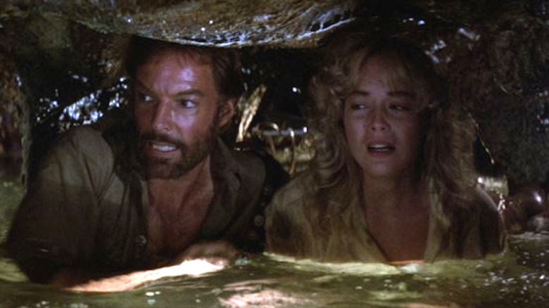 Richard Chamberlain and Sharon Stone look worried in water