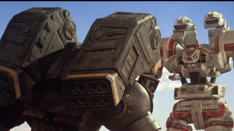 Two giant robots face each other