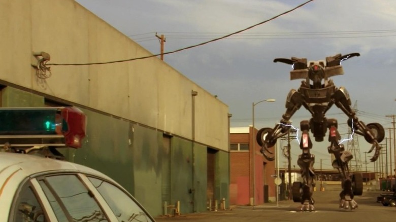 Transmorpher faces off against a police cruiser