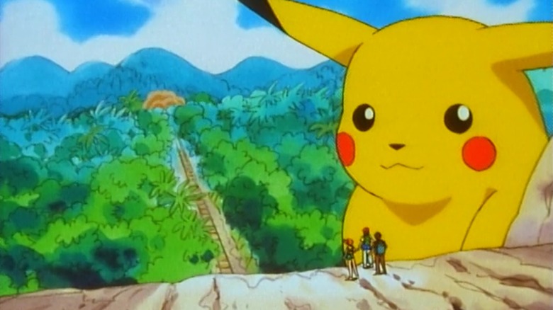 Ash, Misty, and Brock encounter a giant Pikachu