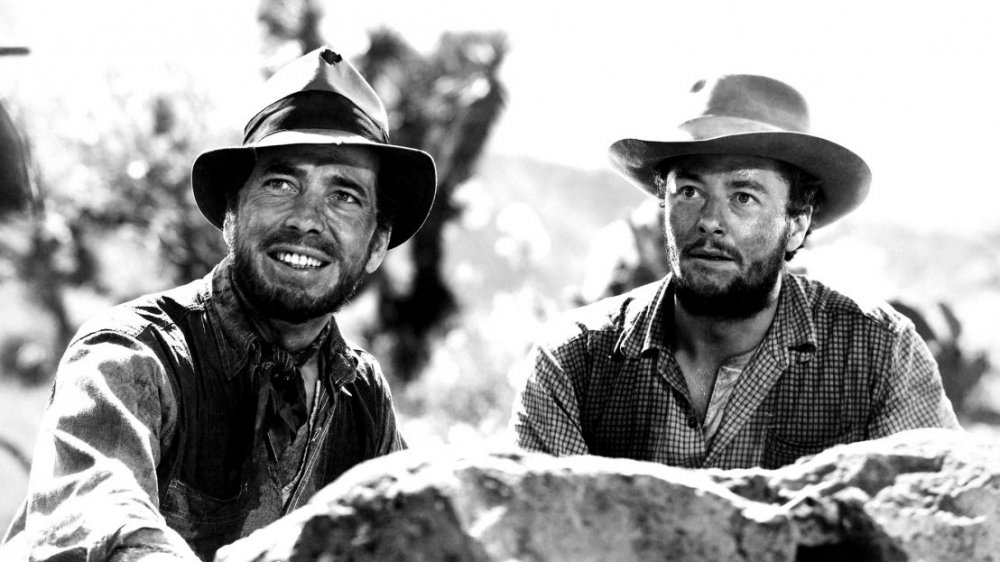 Humphrey Bogart and Tim Holt as Fred C. Dobbs and Bob Curtin