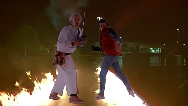 Doc and Marty looking at the DeLorean's flaming tracks