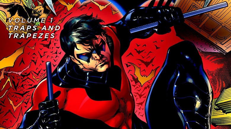 Nightwing holding sticks