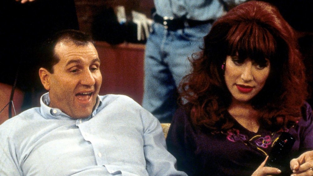 Ed O'Neill as Al Bundy and Katey Sagal as Peg Bundy on Married with Children