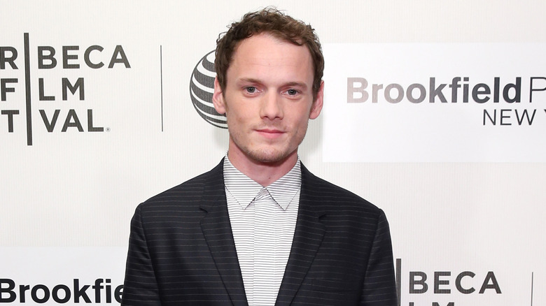 Anton Yelchin poses