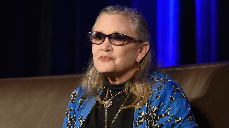 Carrie Fisher on couch