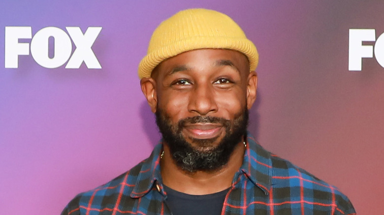 Stephen "tWitch" Boss wears a yellow cap