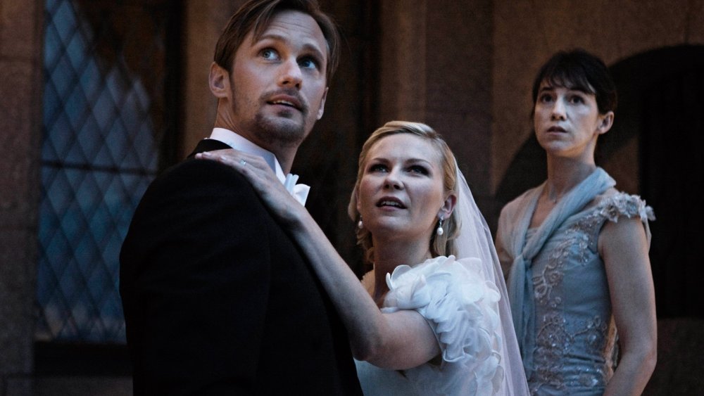 Kirsten Dunst, Charlotte Gainsbourg, and Alexander Skarsgard in Melancholia