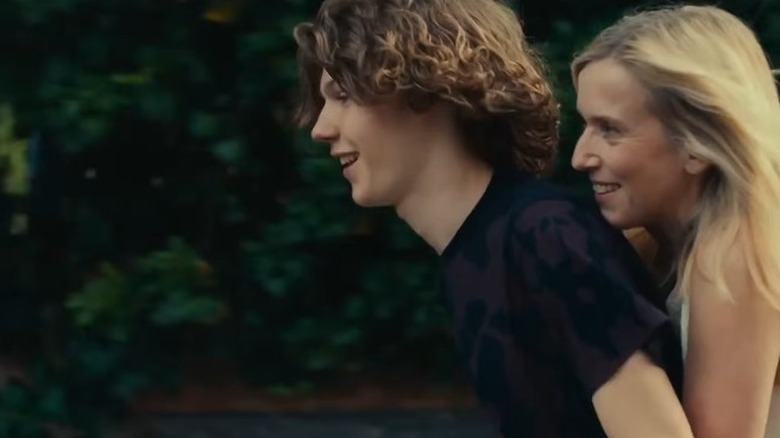 Anne and Théo riding bike together