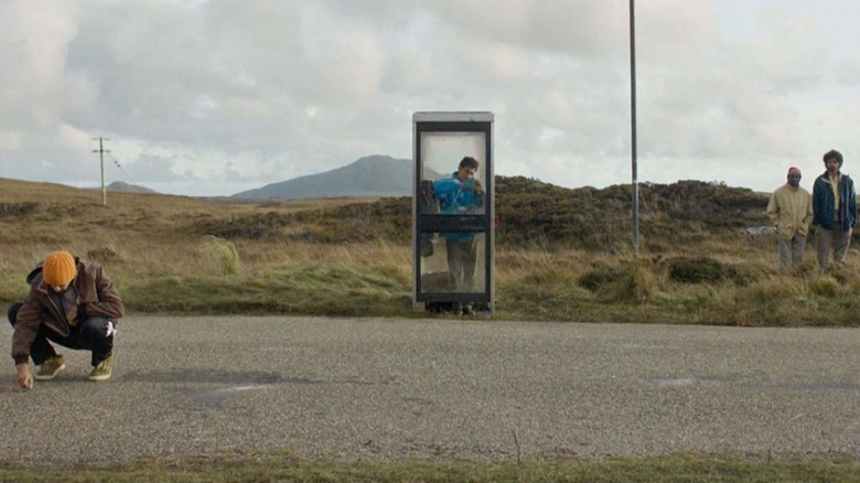 Amir El-Masry in phone booth