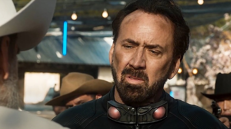 Nicolas Cage wearing bomb collar