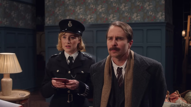 Sam Rockwell and Saoirse Ronan investigating