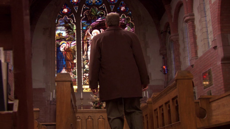 Toby facing the church in The Office