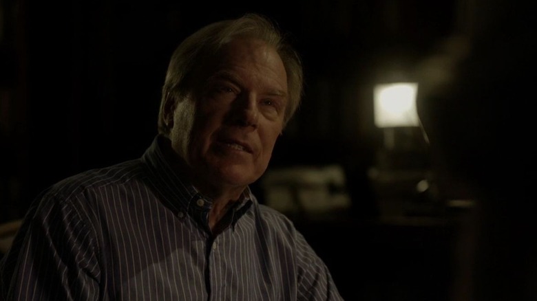 Chuck McGill sits in court 