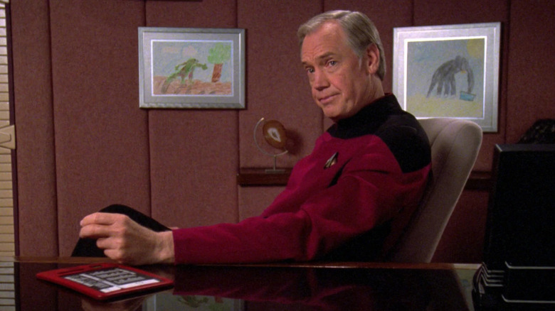 Jellico sits at the captain's desk