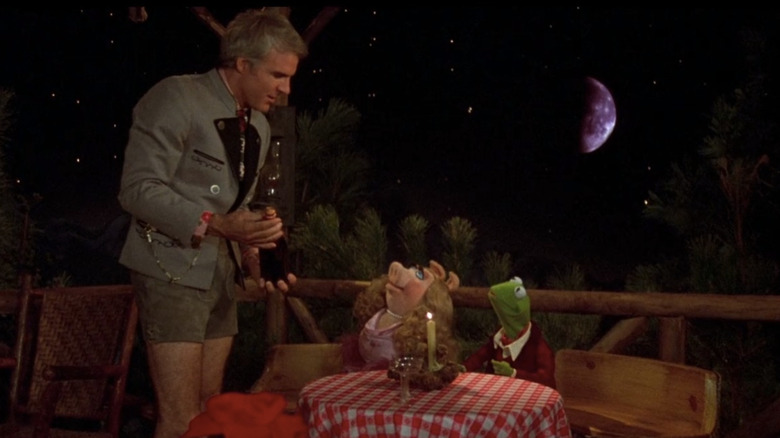 Steve Martin serving Miss Piggy and Kermit