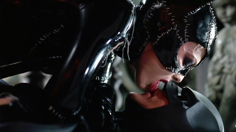 Selina licking Bruce's face