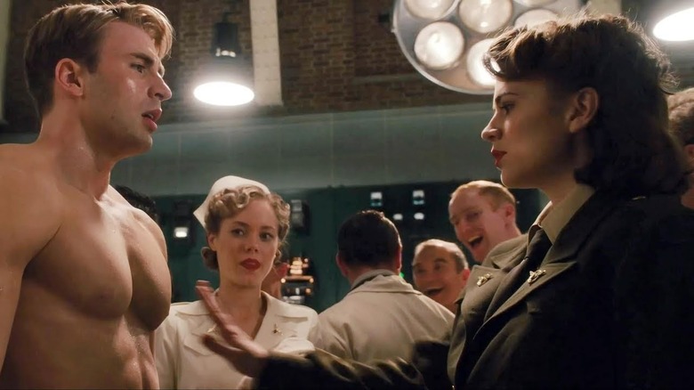 Peggy Carter touches Steve's chest