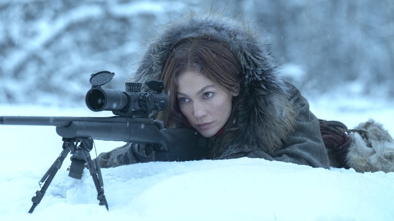 The Mother in snow with sniper rifle