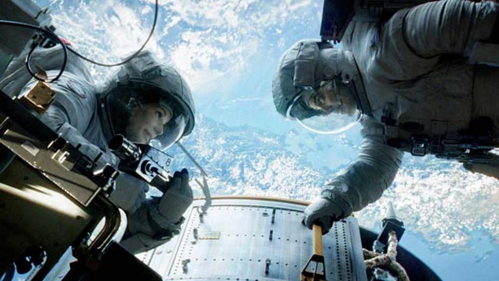 Clooney and Bullock astronauts in orbit