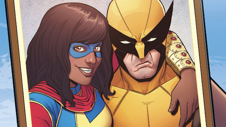 Ms. Marvel taking a photo with Wolverine