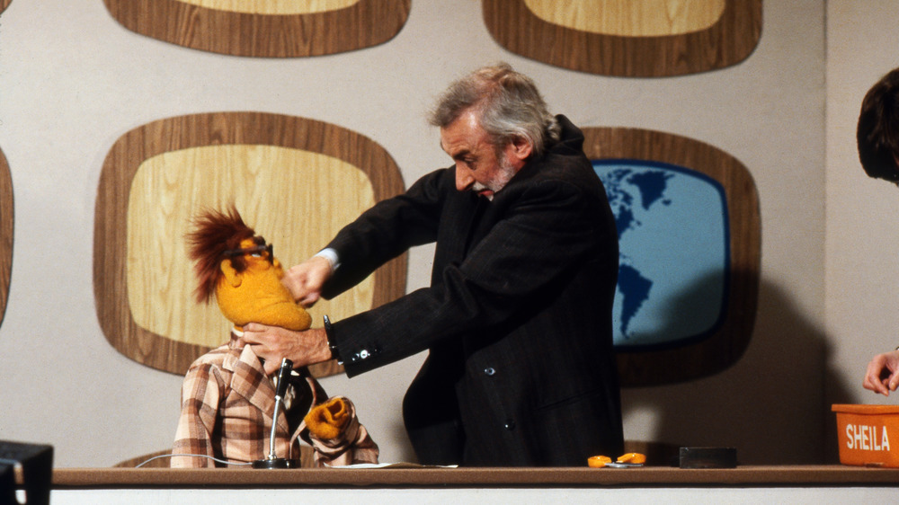 Spike Milligan punching the Muppet Newsman