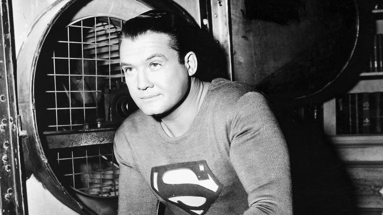 George Reeves kneeling