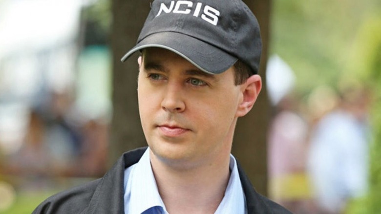 Tim McGee wearing NCIS cap