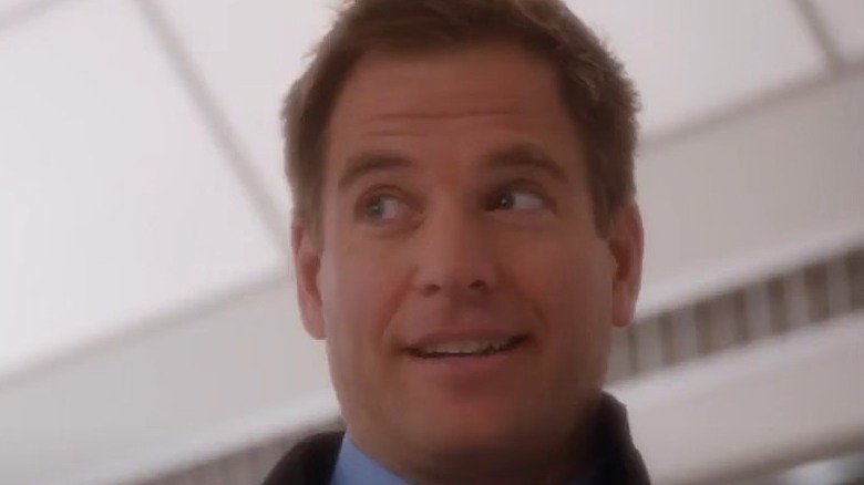 DiNozzo raising his eyebrows and speaking