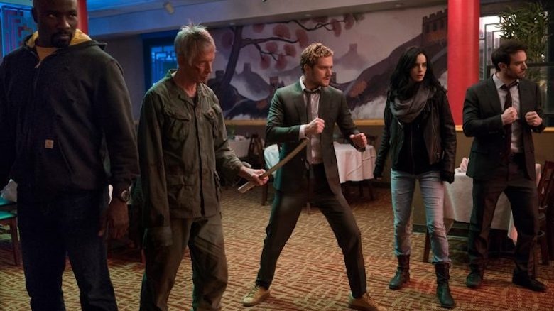 The Defenders in a restaurant