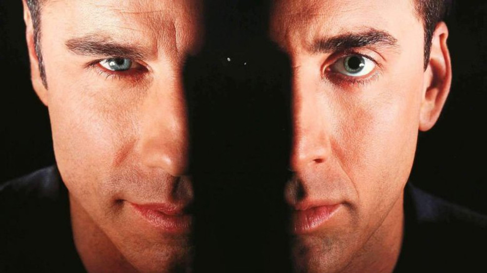 John Travolta Nicolas Cage facing off