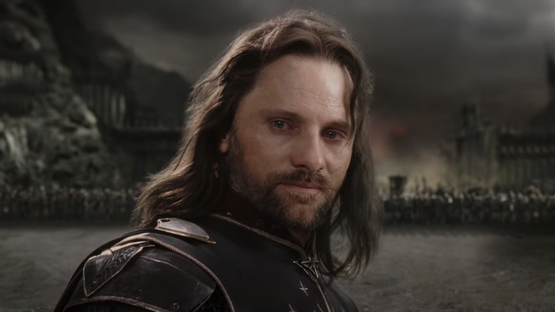 Aragorn looks backward at the Black Gate