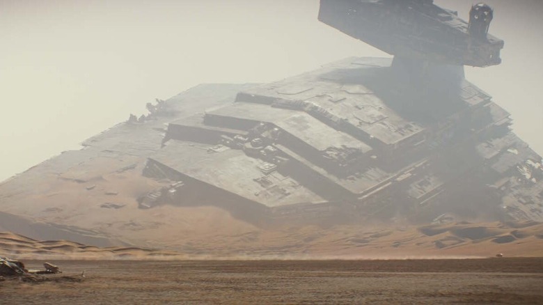 Star destroyer in Jakku desert