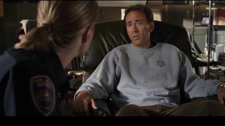 Nicolas Cage talking to cop