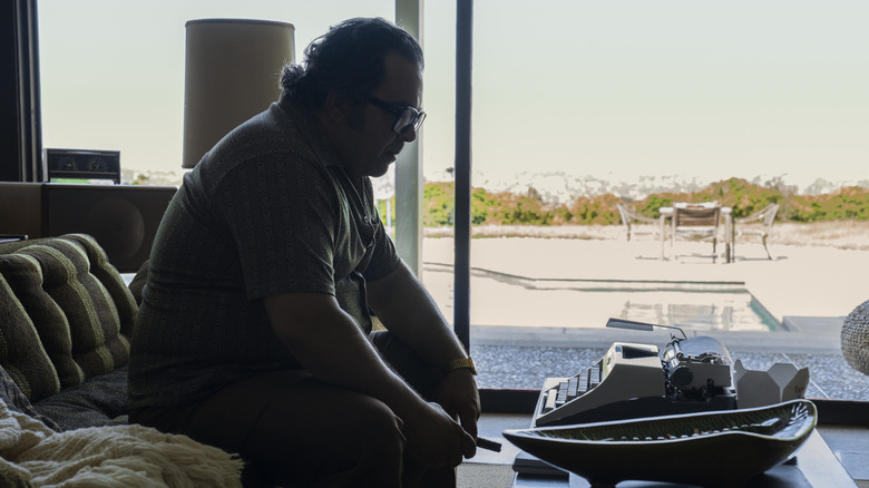 Patrick Gallo as Mario Puzo sitting in front of typewriter