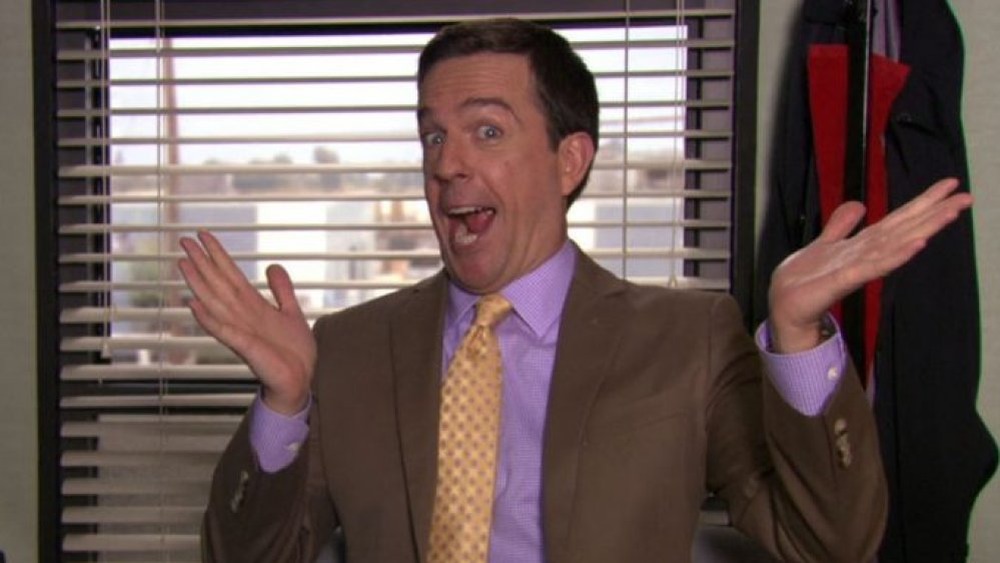 Andy Bernard grinning and posing