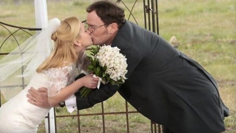 Dwight and Angela kissing on wedding