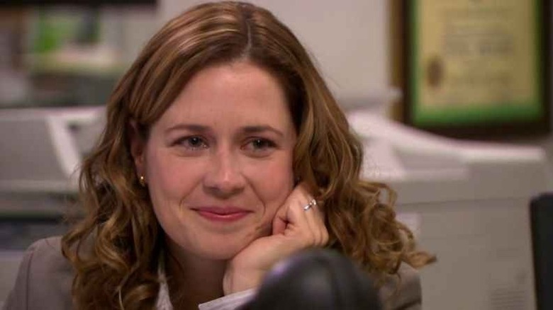 Pam smiling.