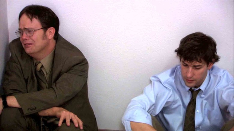 Dwight crying next to Jim