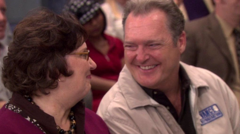 Bob Vance and Phyllis Vance smiling at each other