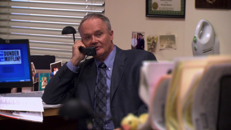 Creed inquires about Michael's chair