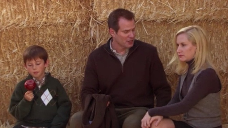 Senator Lipton, Angela, and kid on hay bales