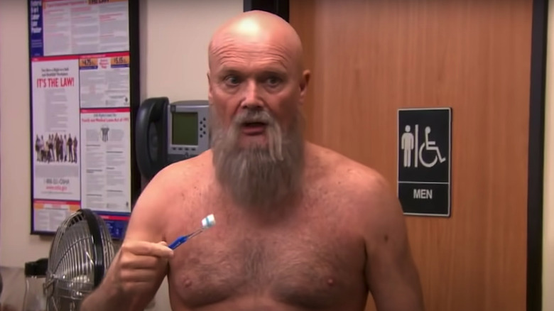 Creed Bratton brushing teeth